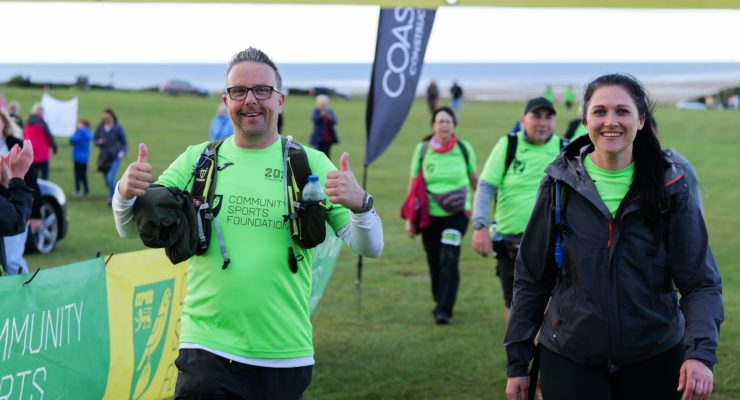 group of walkers. man with thumbs up