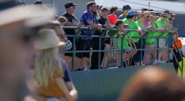 participants watching the cars on the track