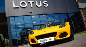 Yellow lotus car with Community Sports Foundation number plate