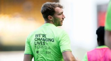 Jack Stacey in green warm-up top