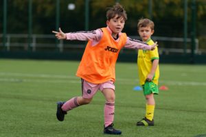 Boy celebrating goal