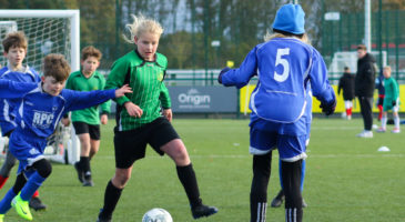 Kids playing football