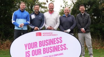 five men standing behind norwich accountancy branding 